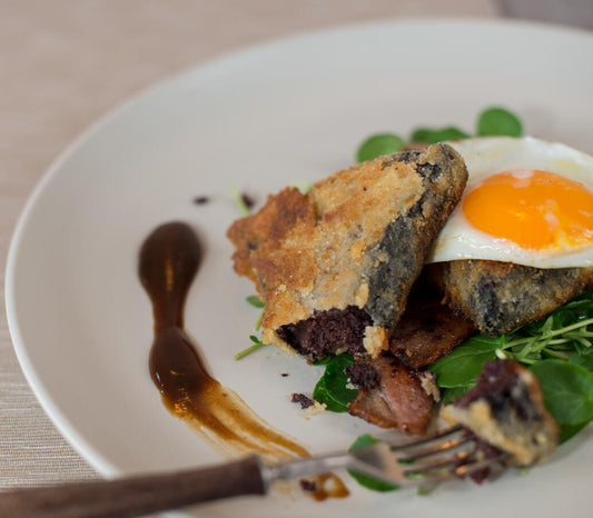 Black Pudding Stuffed Lamb With Minted Broad Beans