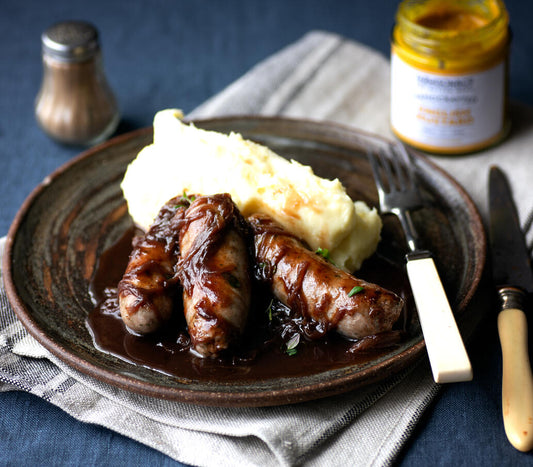Sausages In A Red Wine Sauce With Duchess Potatoes