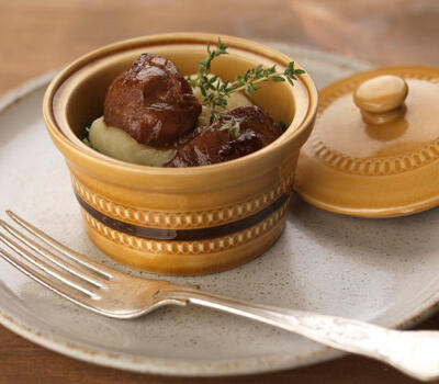 Rare breed pork cheeks with local beer and shallots